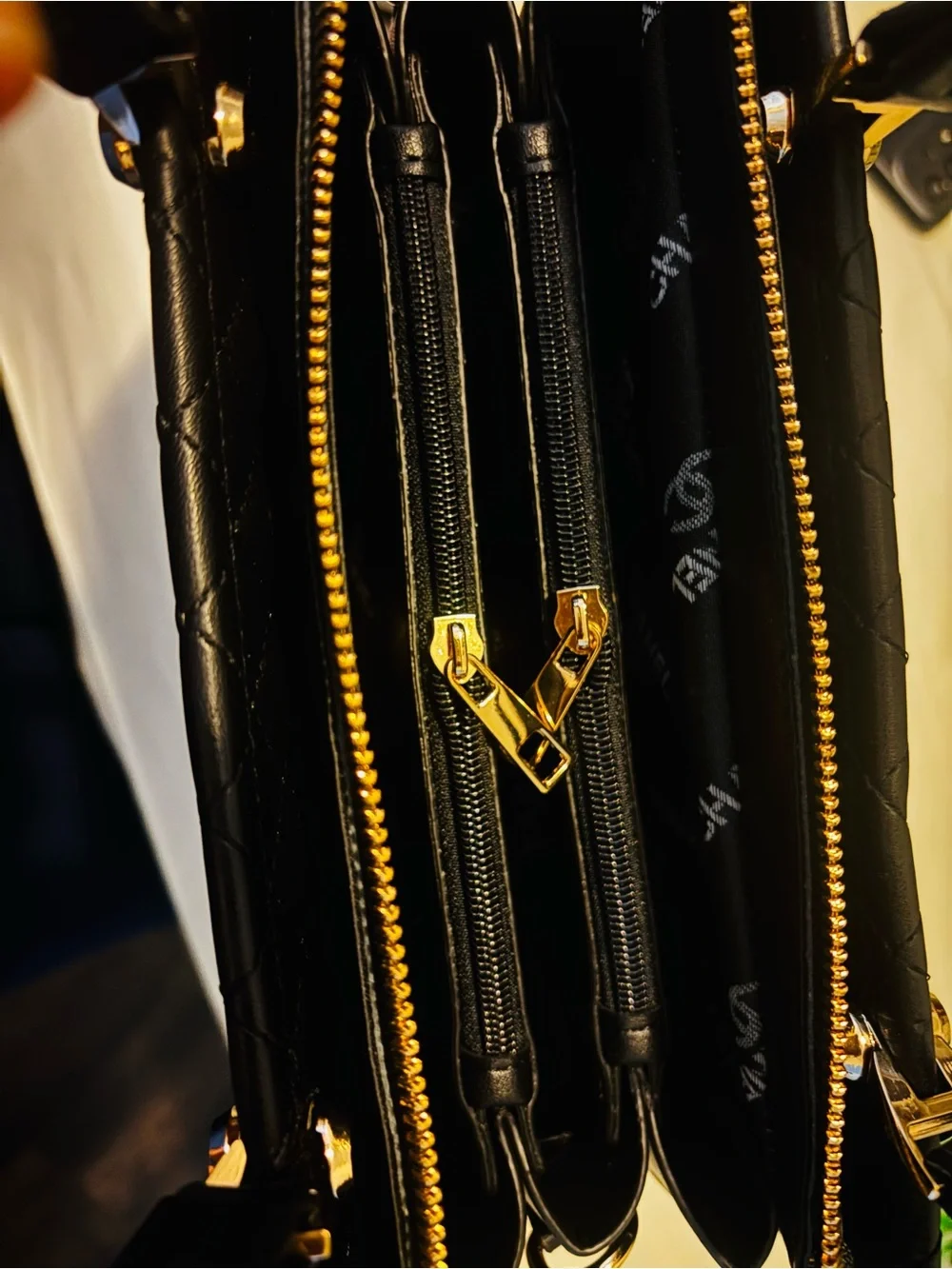 Black Quilted Top-Handle Tote with Gold Hardware